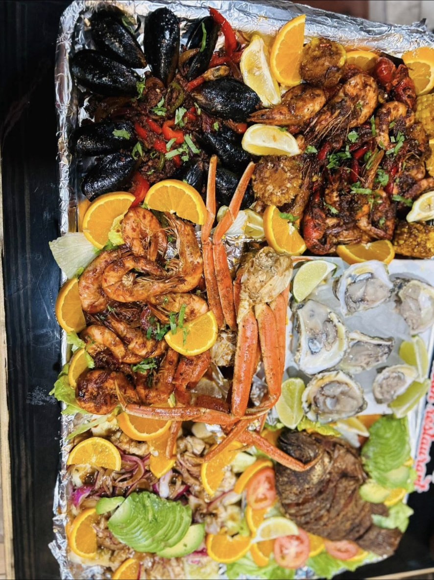 Mariscada seafood platter with crab legs, shrimp, mussels, oysters and fried fish